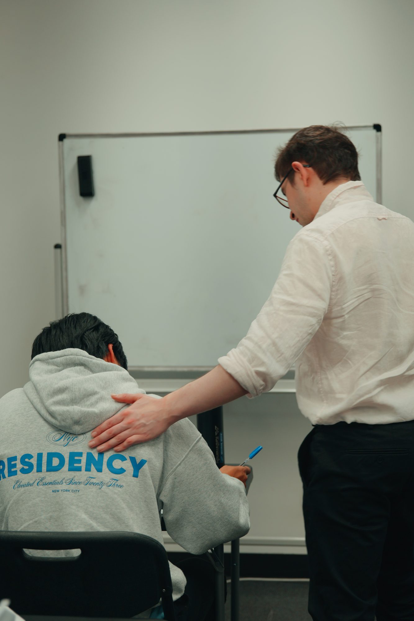 Spartan Tuition co-founder Adrian checking in with a student