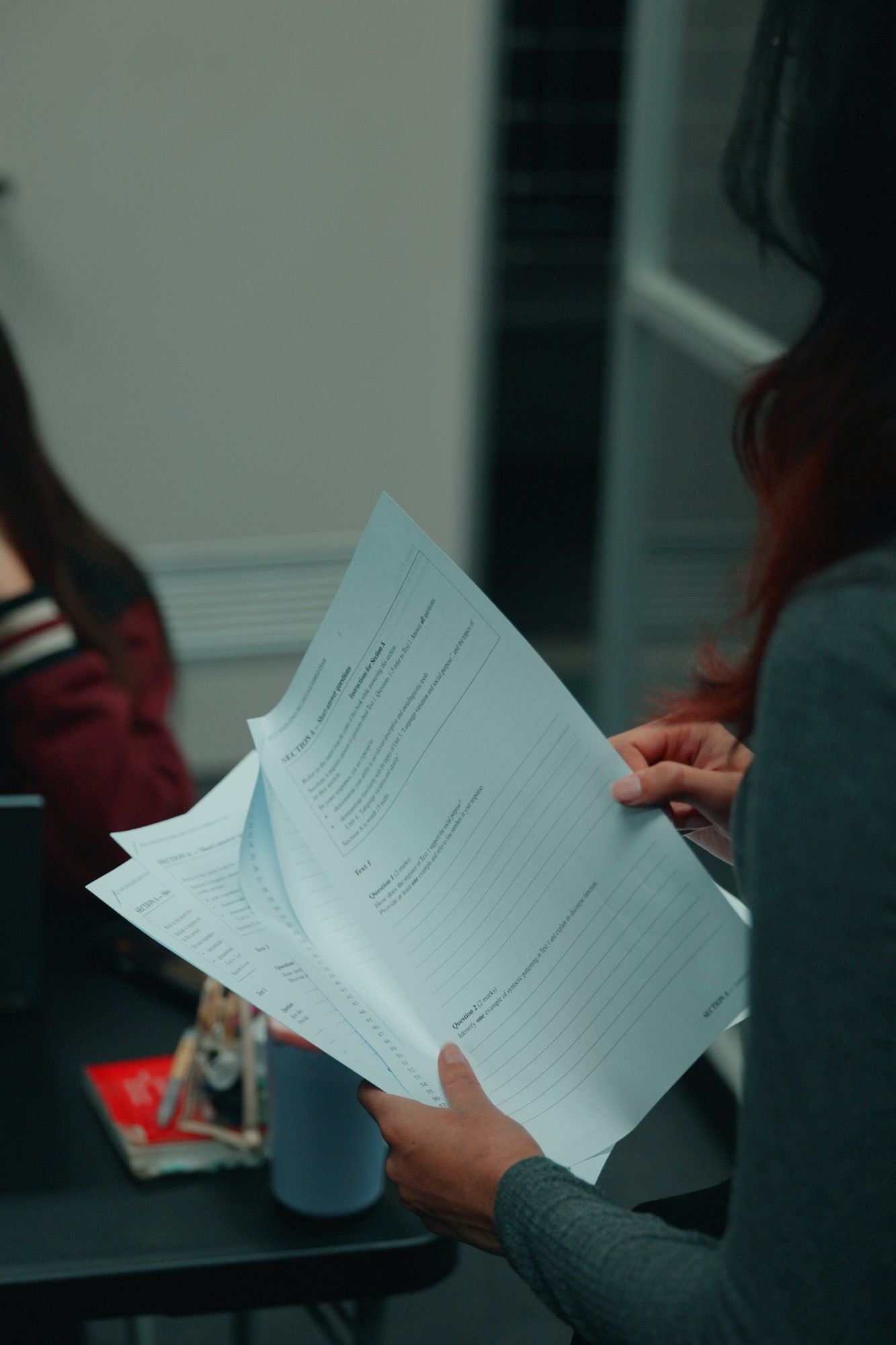 A Spartan Tuition tutor reviewing a practice exam